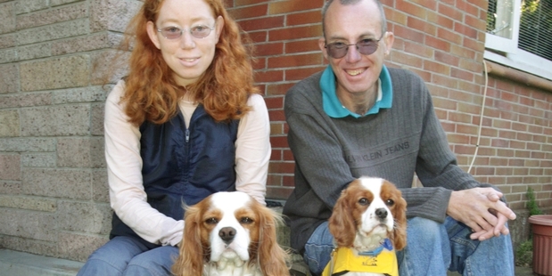 BEST BUDS: Murray Whittington with his hearing dog Frodo gets together with Kylie McGrath and her hearing dog Amos. PHOTO/ PAUL TAYLOR