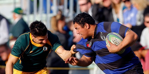 Te Puna's Pomare Pearson takes the ball up against Mount Maunganui. Photo / Andrew Warner