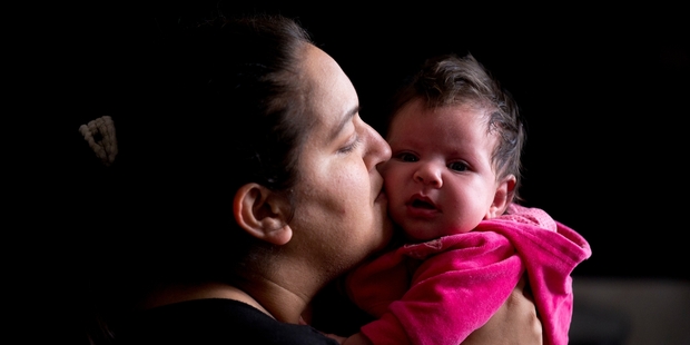 Anjula Manga with her 6-week-old baby who is yet to be named. Photo / Dean Purcell