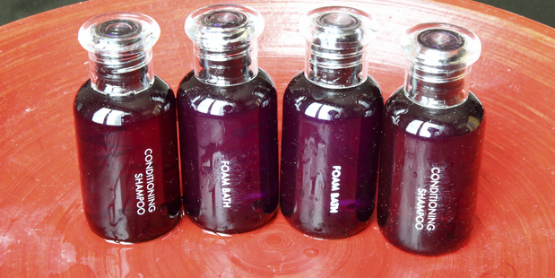 Grabbing a few miniature bottles of shampoo is a small consolation for those travel expenses. Photo / Thinkstock
