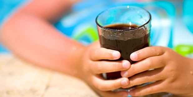 Putting a tax on sugary drinks would decrease childhood obesity and improve oral health.