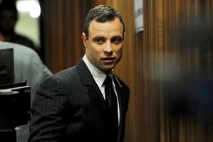 Oscar Pistorius arrives at court in Pretoria. Photo / AP