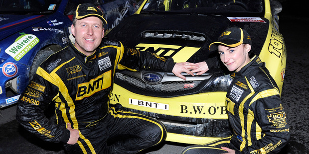 Richard and Sara Mason in front of their NZRC winning Subaru WRX STI. Photo / Geoff Ridder