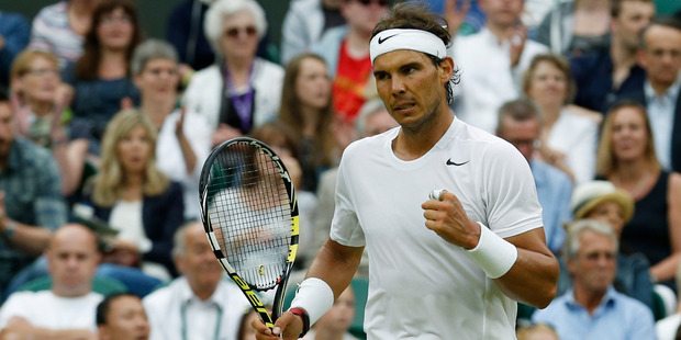 Rafael Nadal of Spain reacts after winning a point against Mikhail Kukushkin of Kazakhstan during their third-round match at Wimbledon. Photo / AP