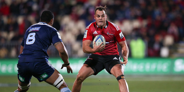 Israel Dagg of the Crusaders makes a break during the round 18 Super Rugby match between the Crusaders and the Blues at AMI Stadium. Photo / Getty Images.