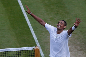Nick Kyrgios of Australia celebrates defeating Rafael Nadal of Spain in their men's singles match on Centre Court at the All England Lawn Tennis Championships in Wimbledon. Photo / AP