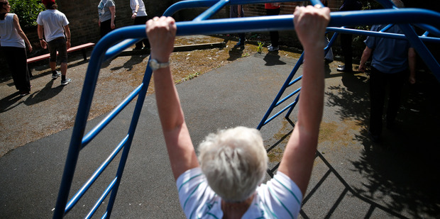 Elderly people participate in a parkour class at a park in south London. Photo / AP