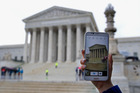 The United States Supreme Court delivered a victory for personal privacy rights last week and ruled the warrantless search of mobile phones unconstitutional. Photo / AP The United States Supreme Court delivered a victory for personal privacy rights last week and ruled the warrantless search of mobile phones unconstitutional. Photo / AP
