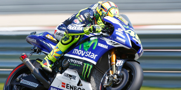 Valentino Rossi has extended his contract with Yamaha until the 2016 season. Photo / AP