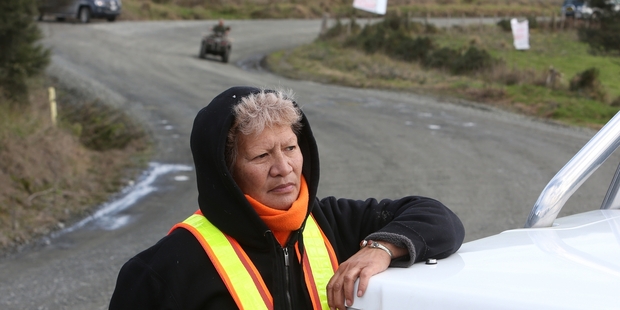 Puti Tipene, of Pipiwai, at a roadblock on the intersection of Pipiwai and Omauri Rds aimed at halting logging trucks. Photo / Michael Cunningham