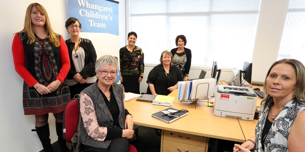National Director of the Children's Action Plan Sue Mackwell (seated, front left) with the Whangarei Children's Team (clockwise from left), Children's director of the Whangarei team Lianne Egli, administrator Katherine Frear, justice service broker Katrina Cowie, social services service broker Karen Wren, co-ordinator Tanya Hay and health service broker Nikki Beazley. Photo/John Stone