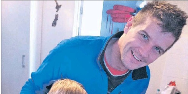 A FELLOW: Gerard Fennessy, 39, pictured with son Charlie, was last week made a fellow of the College of Intensive Care Medicine of Australia and New Zealand. PHOTO/SUPPLIED