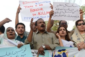 Honor killings are common in Pakistan. Here activists from the PPP Social Media protested the murder of Farzana Parveen, stoned to death by her family last month. Photo / AP