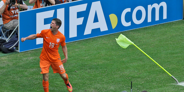 Netherlands' Klaas-Jan Huntelaar celebrates after scoring his side's winning goal from the penalty spot against Mexico. Photo / AP