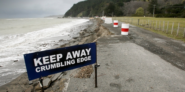 The road to Clifton Motor Camp, showing the damage and warnings posed by erosion in the past four years. Photo / Warren Buckland