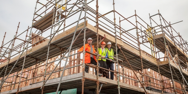 Gary Cox, project manager, sales adviser Janet Coutts and village manager Max Mason on site at Bob Owens Retirement Village.