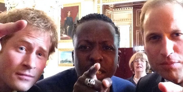 Harry, with Jamal Edwards and William (right) get involved with a Twitter Mirror at Buckingham Palace.