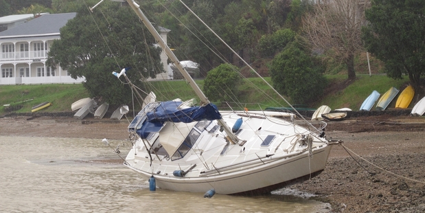 A yacht beached at Opua due to this week's strong winds. Photo / Peter de Graaf