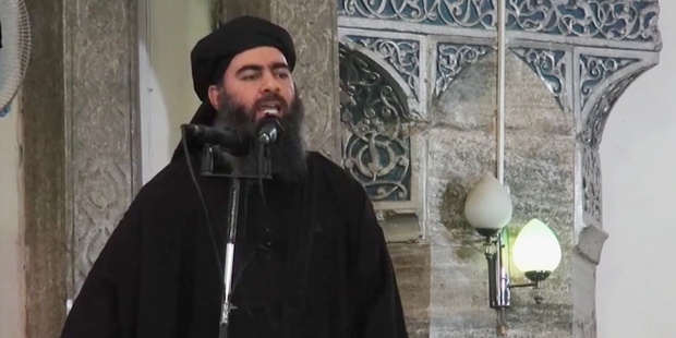 This image made from video posted on a militant website purports to show the self-proclaimed leader of the Islamic State group (Isis), Abu Bakr al-Baghdadi, delivering a sermon at a mosque in Iraq. Photo / AP