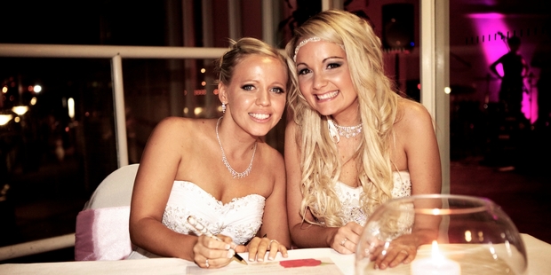Tresne Middleton and Carly Saunders at their commitment ceremony in 2012. They married in New Zealand last week. Photo / New Idea