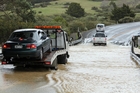 ENTERPRISING: Tiny Dawson ferried cars after flooding stranded motorists. ENTERPRISING: Tiny Dawson ferried cars after flooding stranded motorists.