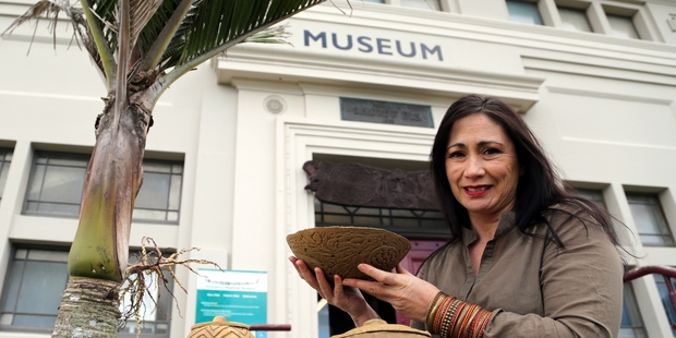 SACRED VESSEL: Artist Leonie Sharp with examples of ipuwhenua, or clay vessels for holding placenta.  Photo/Stuart Munro