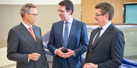 Wolfgang Dürheimer (left)chairman and CEO of Bentley Motors. with Massimiliano Pogliani (centre), Vertu CEO, and Kevin Rose at Bentley Motors HQ announce the partnership between Bentley and Vertu. Photo / Supplied
