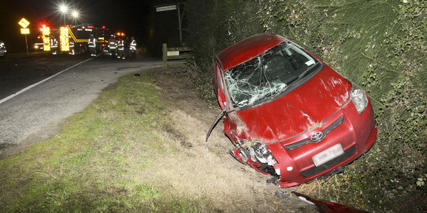 A woman is in Hawke's Bay Hospital after her car rolled into a ditch in Havelock North yesterday. Photo/Warren Buckland