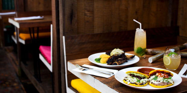 The arepas and twice-cooked beef short ribs on the menu at Conch restaurant. Photo / Babiche Martens.