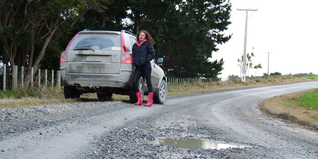 Julie Cotton says she wouldn't object to paying her rates if the unsealed road near her home was kept in a fit state.