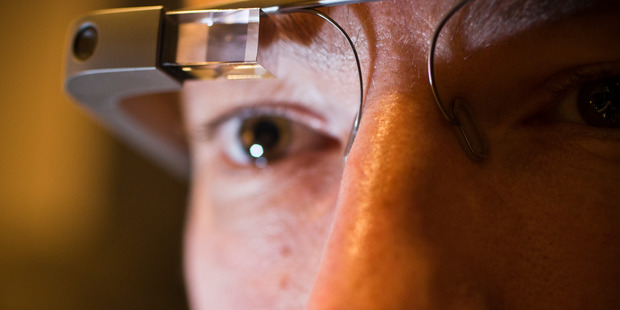 Kieran Waelen wears Google Glass during a demonstration of how wearable technology will impact digital banking. Photo / Greg Bowker