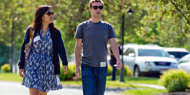 Sun Valley draws some of the biggest names in technology and media including Facebook boss Mark Zuckerberg pictured here with his wife Priscilla Chan arriving at the 2011 event. Photo / AP