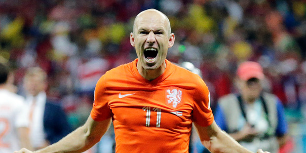 Netherlands' Arjen Robben celebrates after the Netherlands defeated Costa Rica 4-3 in a penalty shootout after a 0-0 tie during the World Cup quarterfinal soccer match. Photo / AP