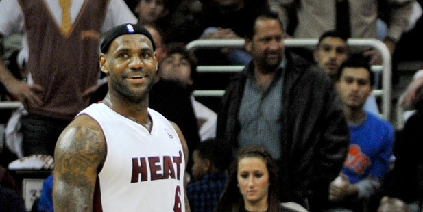 LeBron James plays for Miami against Cleveland as Cavaliers owner Dan Gilbert watches. Photo / AP