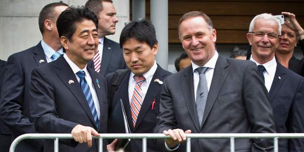 Shinzo Abe (left) and John Key have much work to do if a basic deal is to emerge by the end of this year. Picture / Greg Bowker