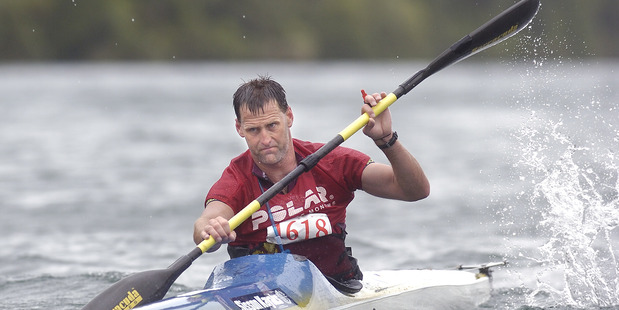 Individual entry Scott Donaldson from Rotorua comes from the kayak leg of the Wild Moa on Lake Tarawera on Saturday 13 January 2007 Daily Post Photograph by Ben Fraser DPM 25Apr14 - TASMAN CRO