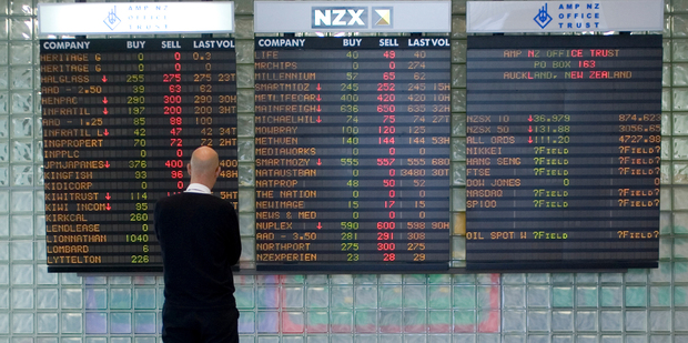 The New Zealand Stock Exchange board in the AMP Building on the corner of Custom St and Albert St in Auckland reflects the overnight crash on Wall Street. Tuesday 30 September 2008 New Zealan