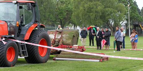 A man blesses the scene in Kirkpatrick Park, Hastings, where a four year-old boy was killed, when playing near a Hastings District Council tractor and lawn-mower.