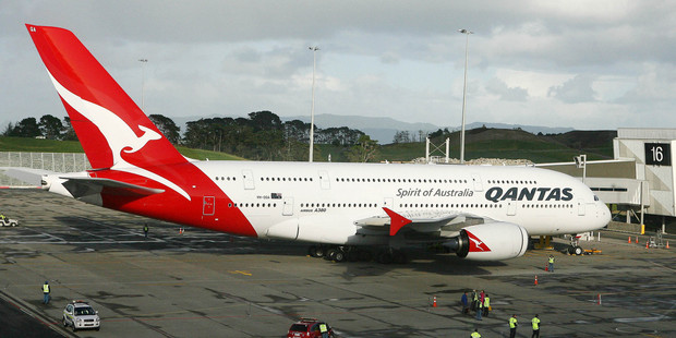 Qantas Airbus A380, the worlds largest commercial aircraft, flying over Auckland on its first visit to New Zealand. Photo / NZPA