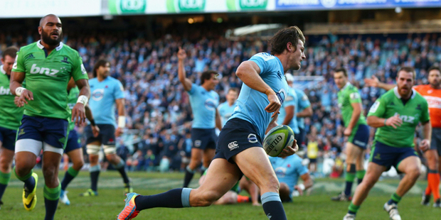 Rob Horne of the Waratahs scores a try during the round 18 Super Rugby match between the Waratahs and the Highlanders at Allianz Stadium. Photo / Getty Images.