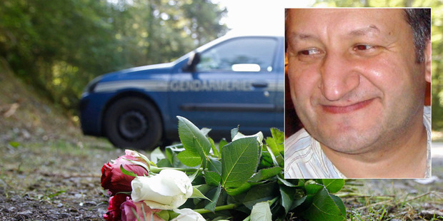 Roses at scene of the killing. Inset: Saad al-Hilli. Photo / AP file