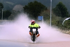 The weather has been playing tricks this week, with this motorcyclist meeting a flood near Otiria, out from Moerewa.Photo/John Stone The weather has been playing tricks this week, with this motorcyclist meeting a flood near Otiria, out from Moerewa.Photo/John Stone