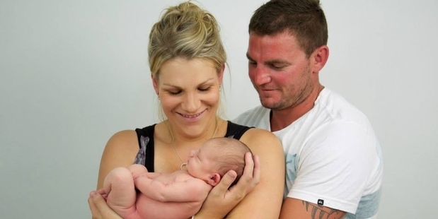The Hawke's Bay community has helped raise more thank $17,000 after the death of Robert Barr, pictured with his wife Laura and baby Asha. Photo/File