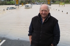 Christchurch man Russell Horrell was rescued from his van (pictured in the background) at the flooded Taumarere River near Kawakawa. Photo/Peter de Graaf Christchurch man Russell Horrell was rescued from his van (pictured in the background) at the flooded Taumarere River near Kawakawa. Photo/Peter de Graaf