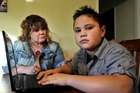 SAFETY CONSCIOUS: Tauranga mum Karen Wiringi talks to son Nikora, 11, about the dangers of the internet but expects the message to be reinforced at school.PHOTO/GEORGE NOVAK SAFETY CONSCIOUS: Tauranga mum Karen Wiringi talks to son Nikora, 11, about the dangers of the internet but expects the message to be reinforced at school.PHOTO/GEORGE NOVAK