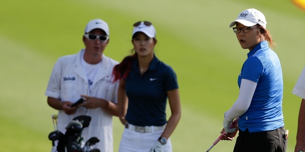 Lydia Ko (right) now has the same instructors as Michelle Wie who as a teen struggled to manage the demands of professional golf. Photo / AP