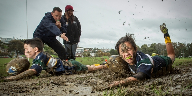 Jordan Woodley, 12 and his brother, Caleb, 8, are encouraged to play rugby by their parents. Photo / Michael Craig