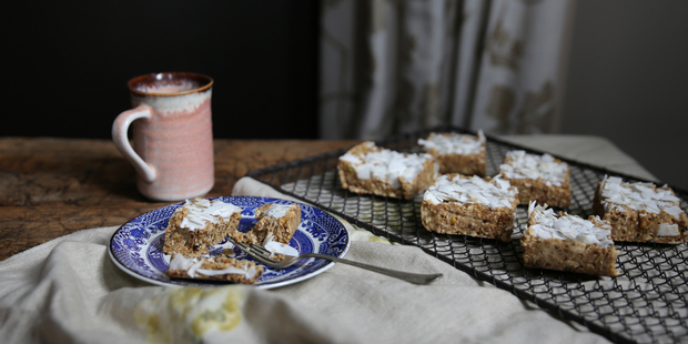 Coconut cream fudge slice with prunes and lemon zest. Photo / Eleanor Ozich