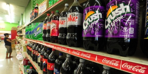 An approved tax would mean a major defeat for the soda industry, which has spent millions to crush the effort across America. Photo / AFP
