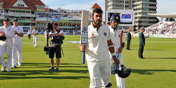 India's Murali Vijay leaves the field after scoring 122 runs not out. Photo / AP